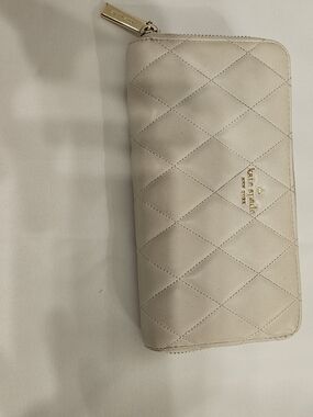kate spade Quilted Cream Zip-Around Leather Wallet with Gold Logo